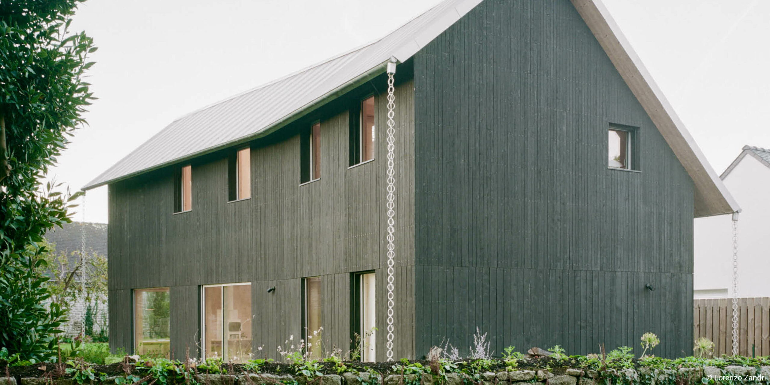 Construction maison individuelle en poutres en I, CLT et ouate de cellulose